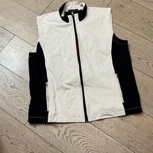 Woman’s INC black and cream zip vest. Size large. Front zip pockets. High collar
